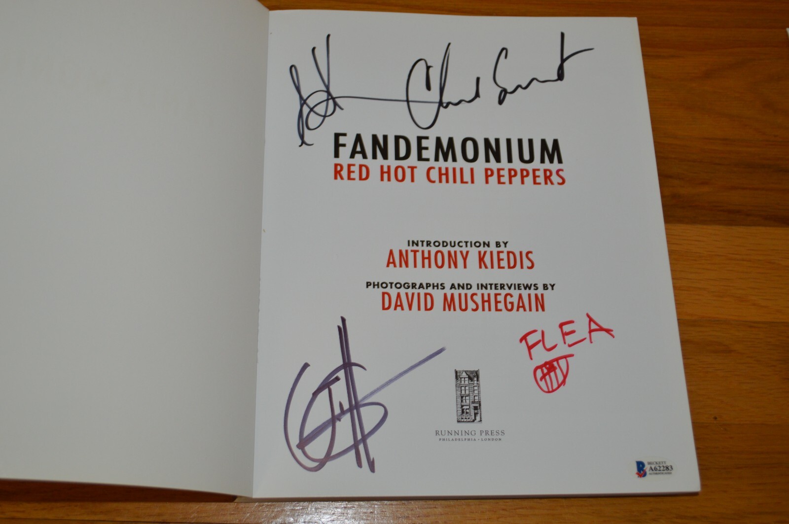 Red Hot Chili Peppers Autographed “Fandemonium” Softcover Book with Beckett LOA