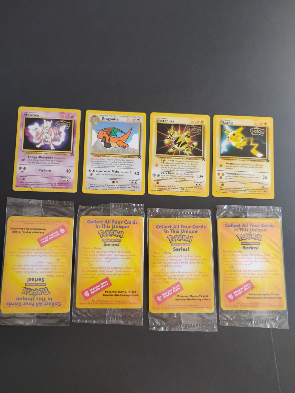 Pokemon Gold Stamp WB The First Movie 1999 sealed 4 card set