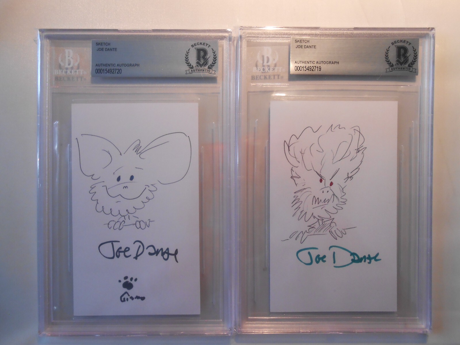 Joe Dante (Set of 2) Hand Drawn & Signed Sketches Gremlins Beckett BAS Slabbed