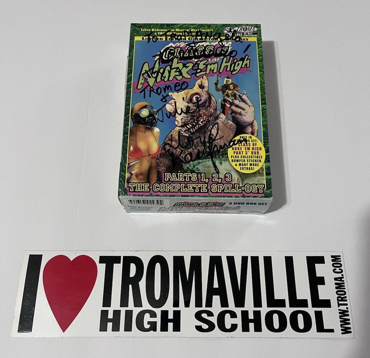 SIGNED Lloyd Kaufman Nuke ‘Em High Spill-Ogy Box Set + RARE Tromaville Sticker